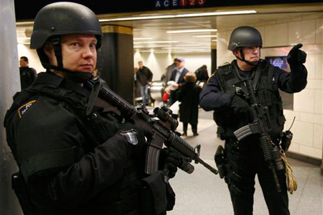 NYPD officers at Penn Station this past April 